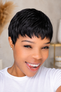 Short pixie cut human hair wig styled with soft feathered layers and a delicate fringe